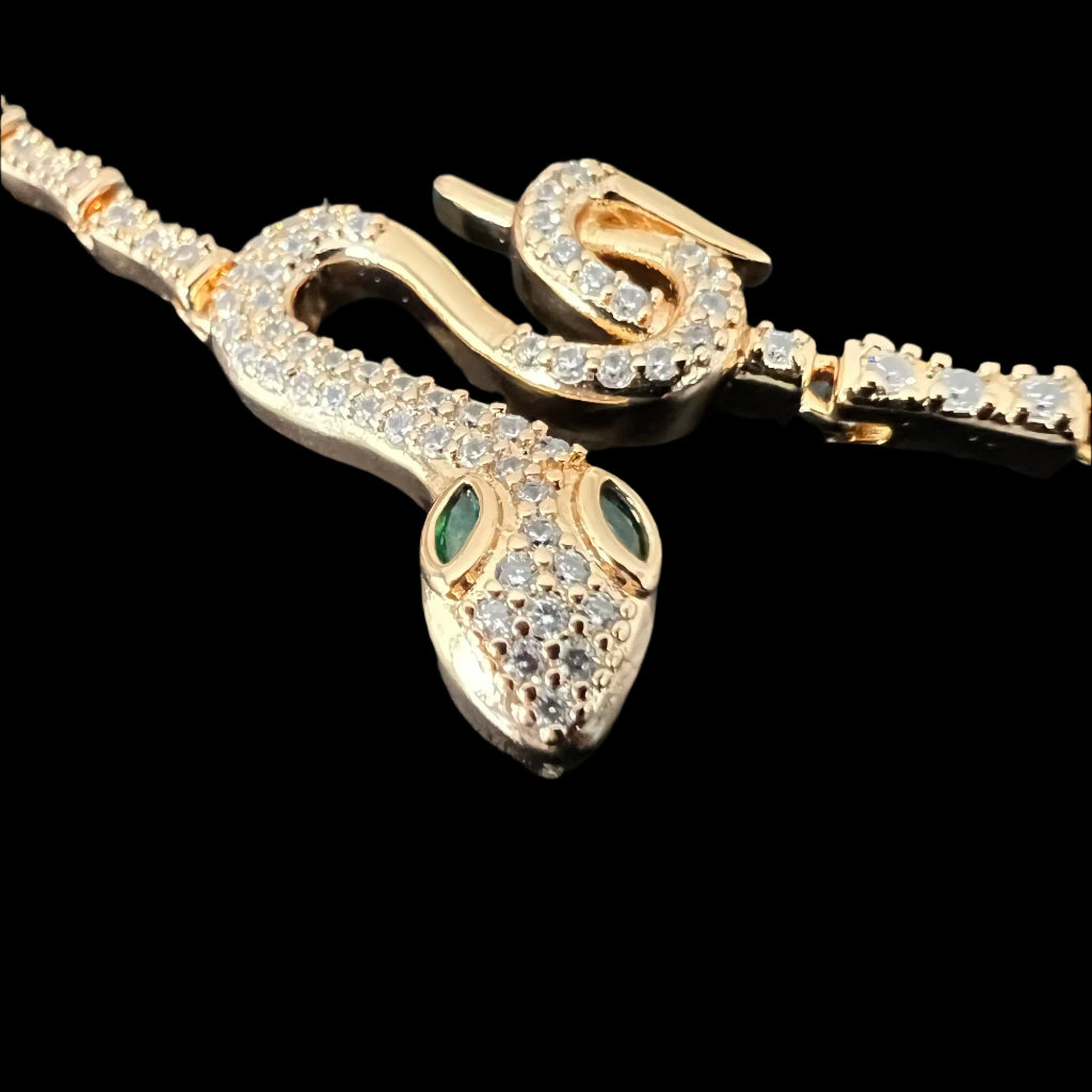 Gold-Tone Snake Bracelet with Green Eyes