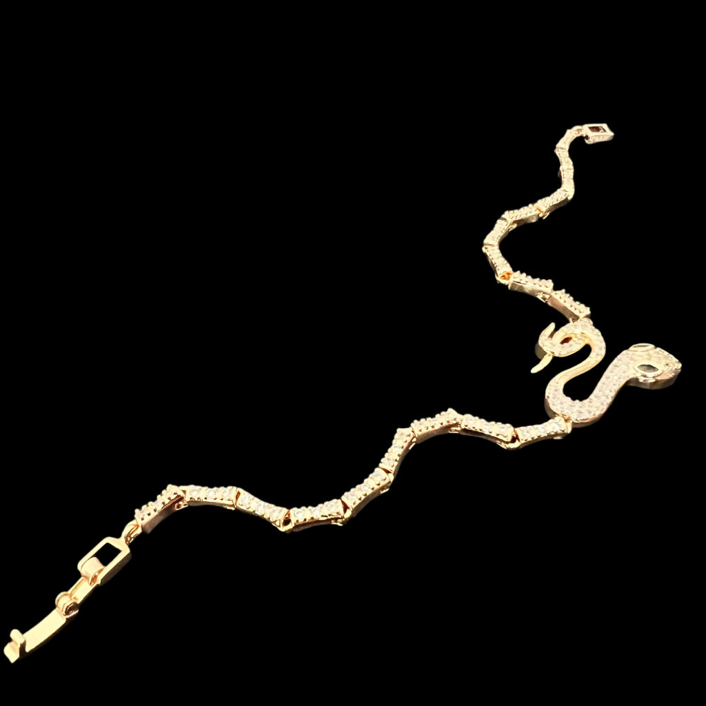 Gold-Tone Snake Bracelet with Green Eyes