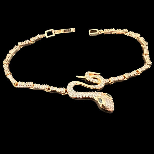 Gold-Tone Snake Bracelet with Green Eyes