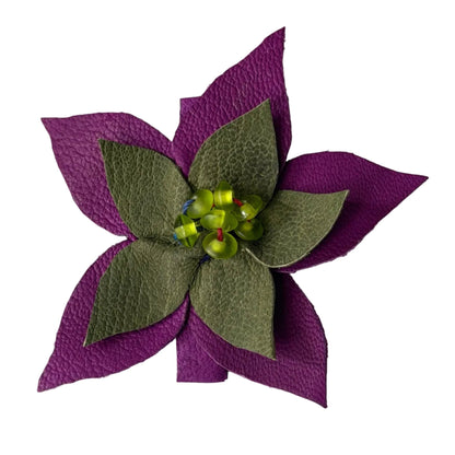 The Estrella-handmade kidskin flower featuring purple outer petals, olive green inner petals
