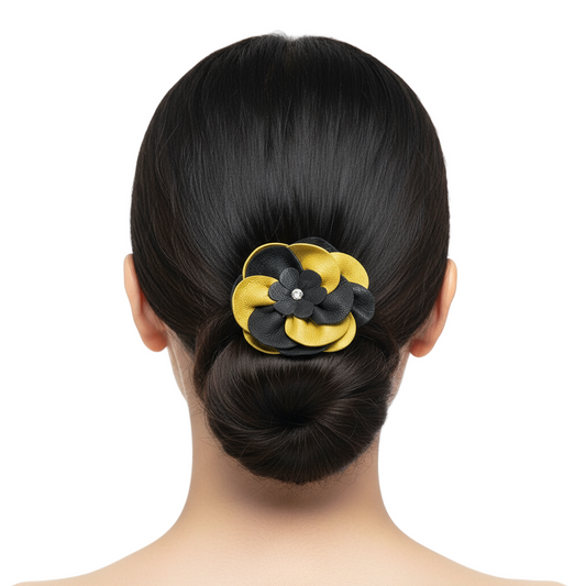 Model wearing black and gold flower hair tie
