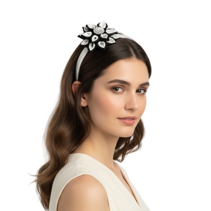 Model wearing black and white leather flower headband