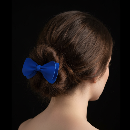 Model wearing blue leather bow hair clip with black background