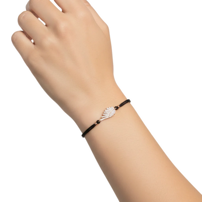 Model wearing bracelet on white background