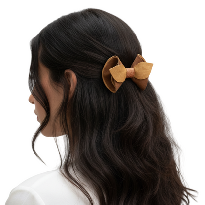Model wearing leather bow hair clip