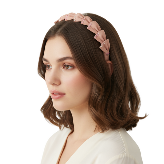 Model wearing pink bow headband