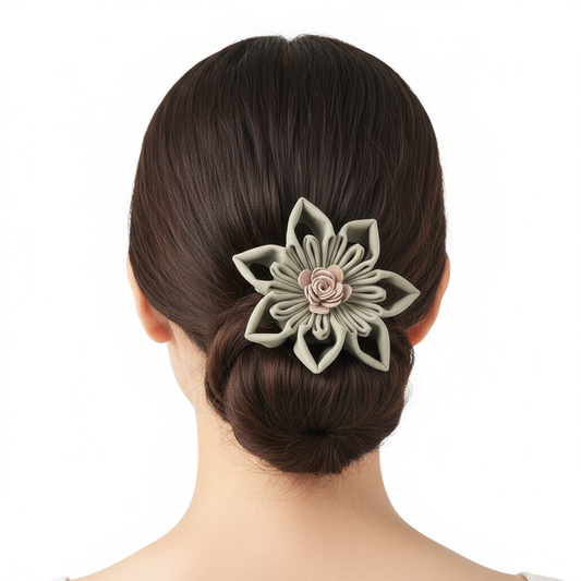 Model wearing sage green flower hair tie